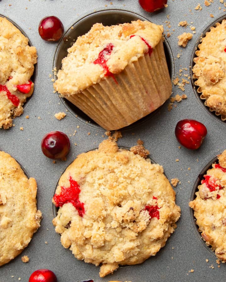 Vegan Cranberry Muffins in a muffin tin.