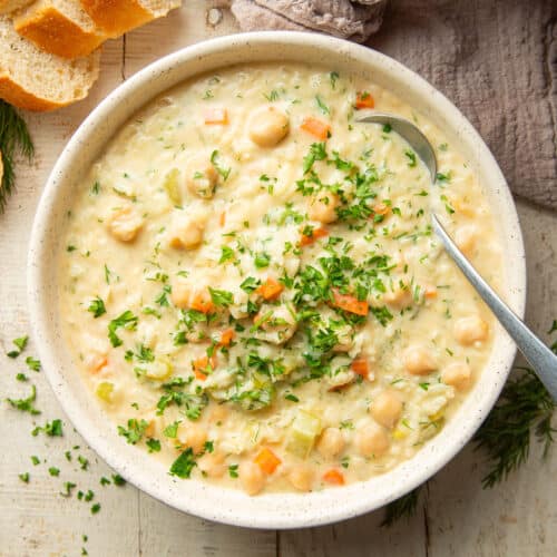Bowl of Vegan Avgolemono with spoon.