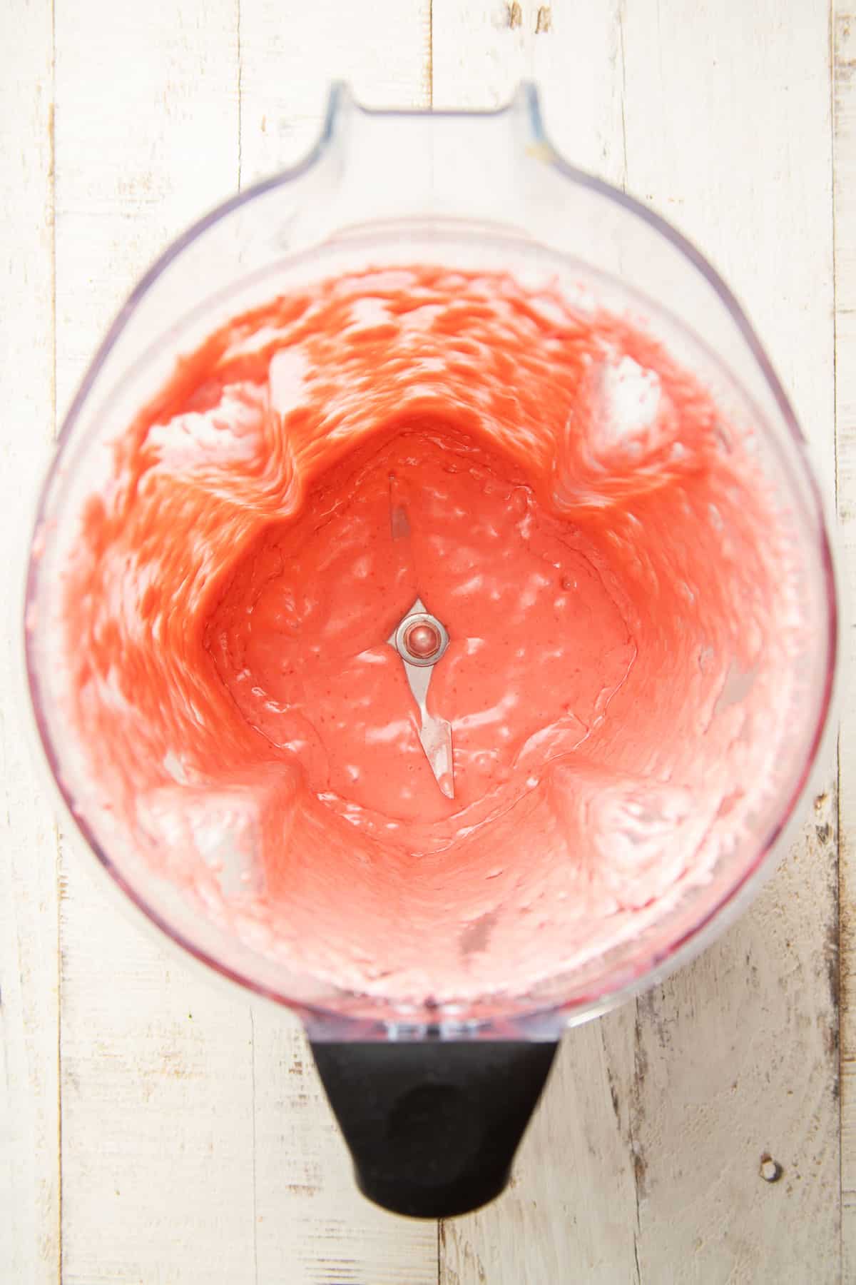 Raspberry vinaigrette in a blender.
