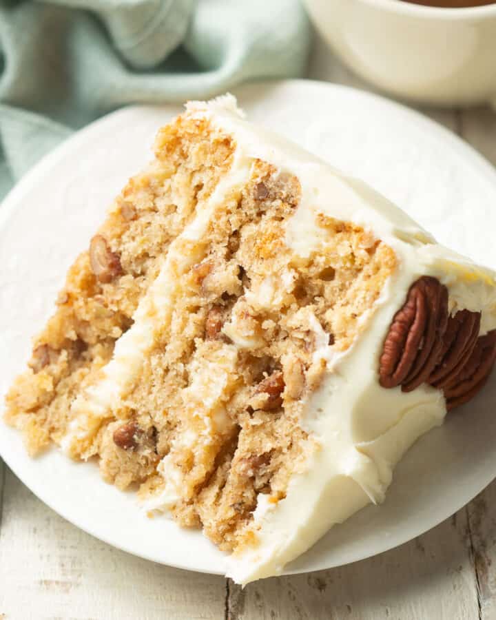 Slice of Vegan Hummingbird Cake on a plate.