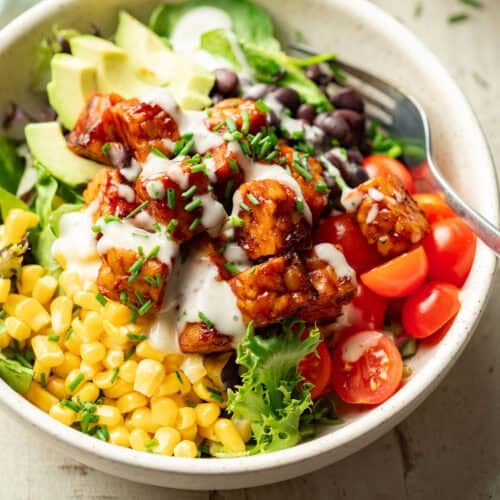 Bowl of Barbecue Tempeh Salad with a fork.