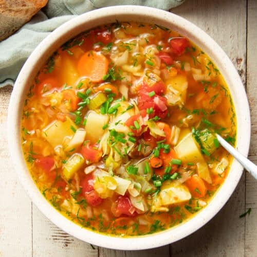 Bowl of Cabbage Soup with a spoon.
