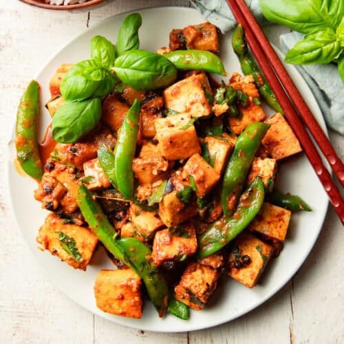 Plate of Tofu Pad Ped with chopsticks.