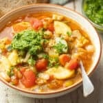 Bowl of Soupe au Pistou with a spoon.
