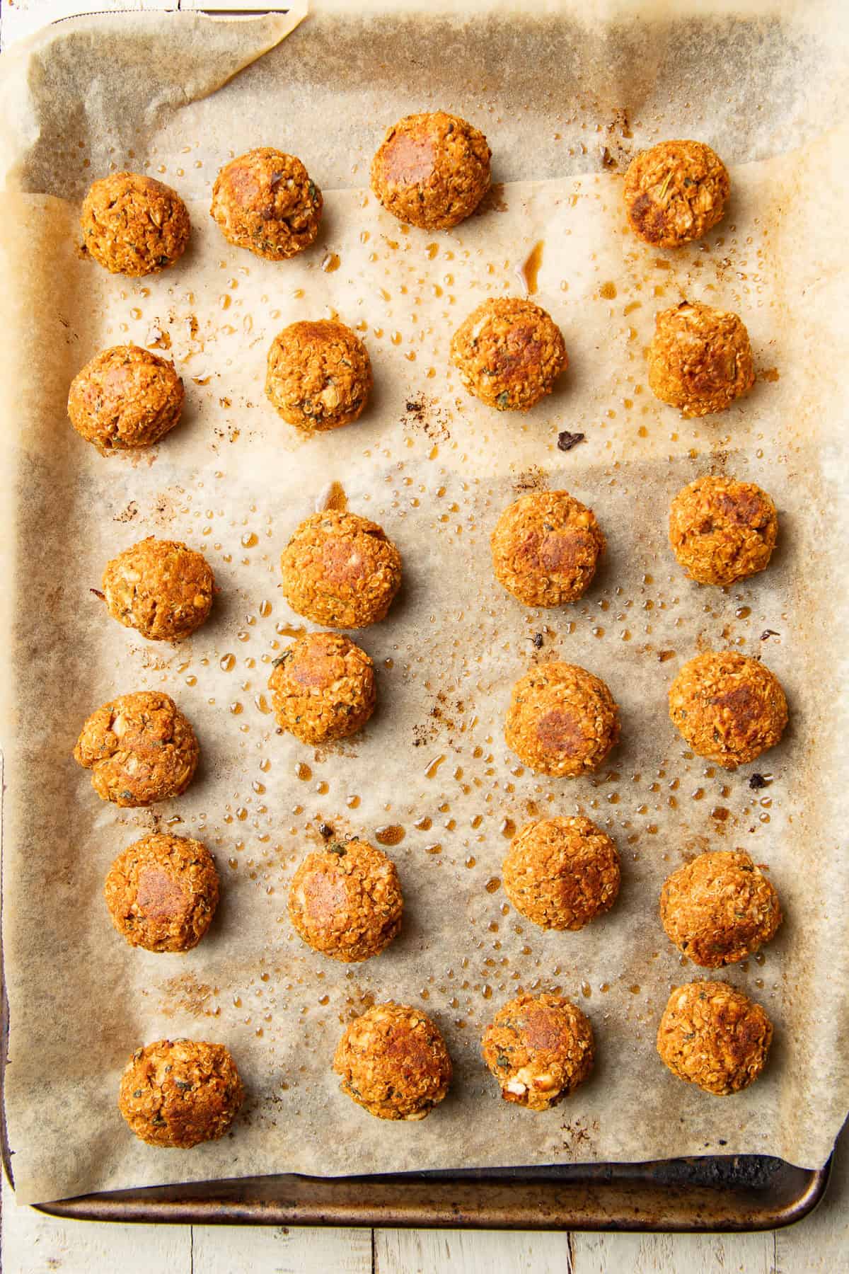 Baked Quinoa Meatballs on a baking sheet.
