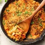 White Bean Skillet with wooden serving spoon.