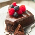 Vegan Chocolate Olive Oil Cake with a bite taken out and sitting on a fork.