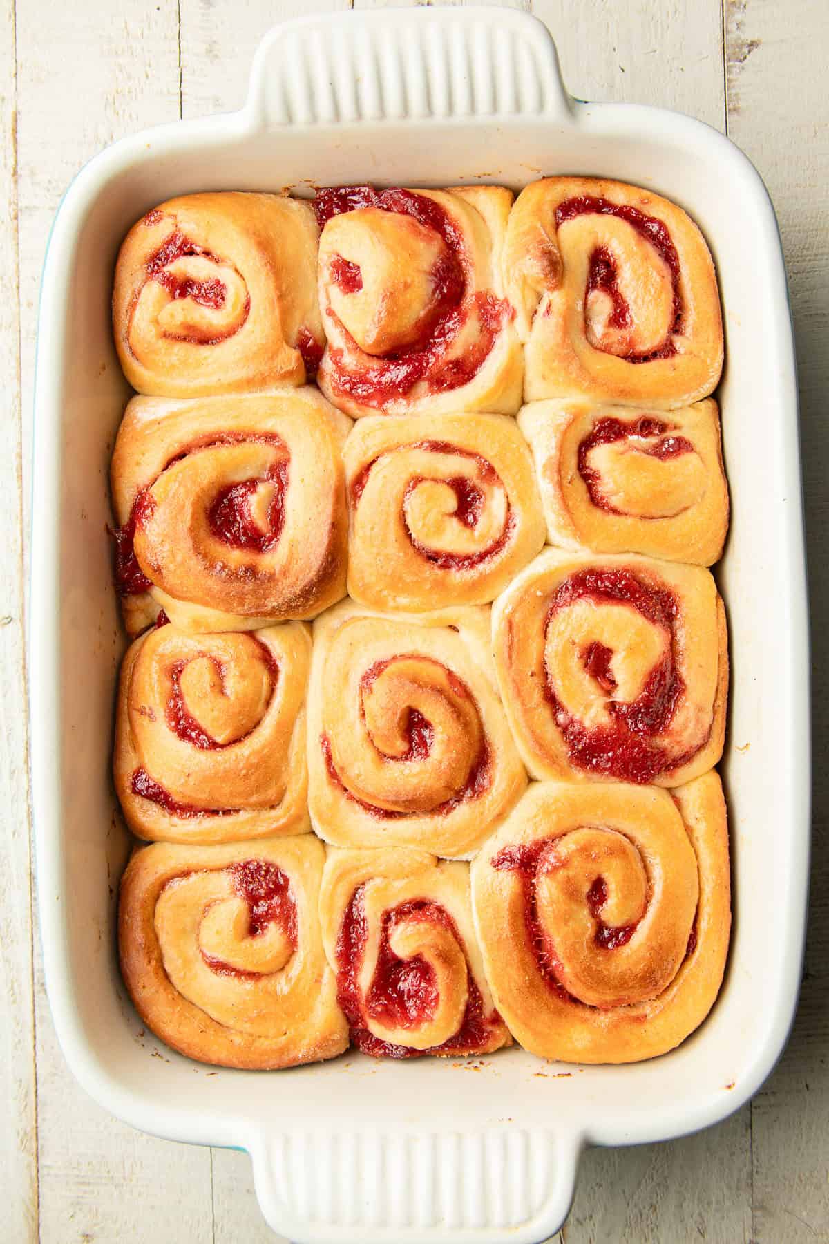 Unfrosted Vegan Strawberry Rolls in a baking dish.