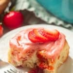 Vegan Strawberry Roll on a plate with a bite taken out.