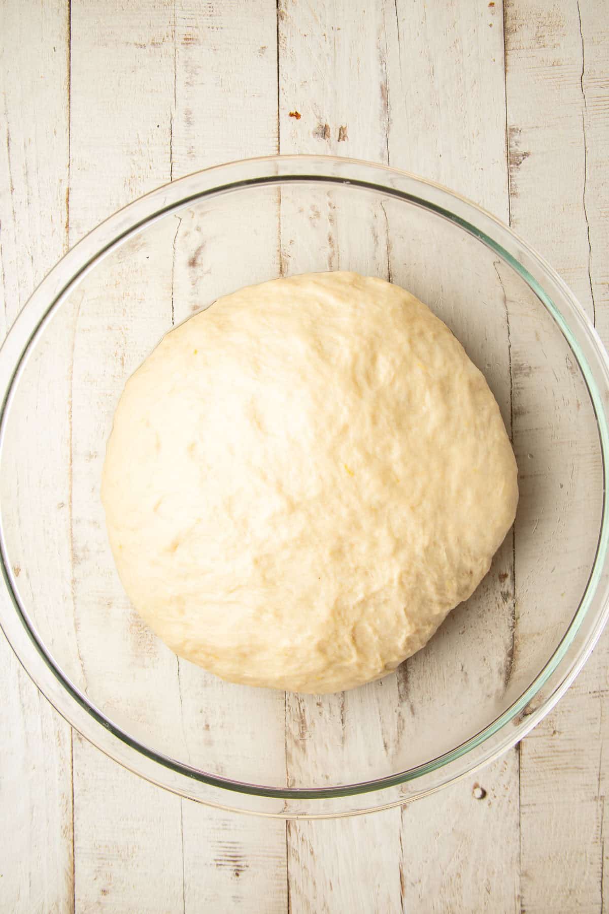 Vegan Strawberry Roll dough in a bowl after rising.