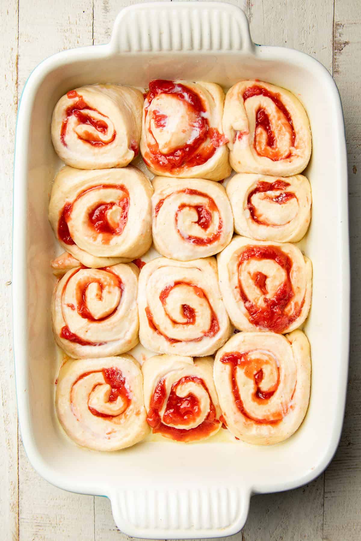 Unbaked Vegan Strawberry Roll in a baking dish.