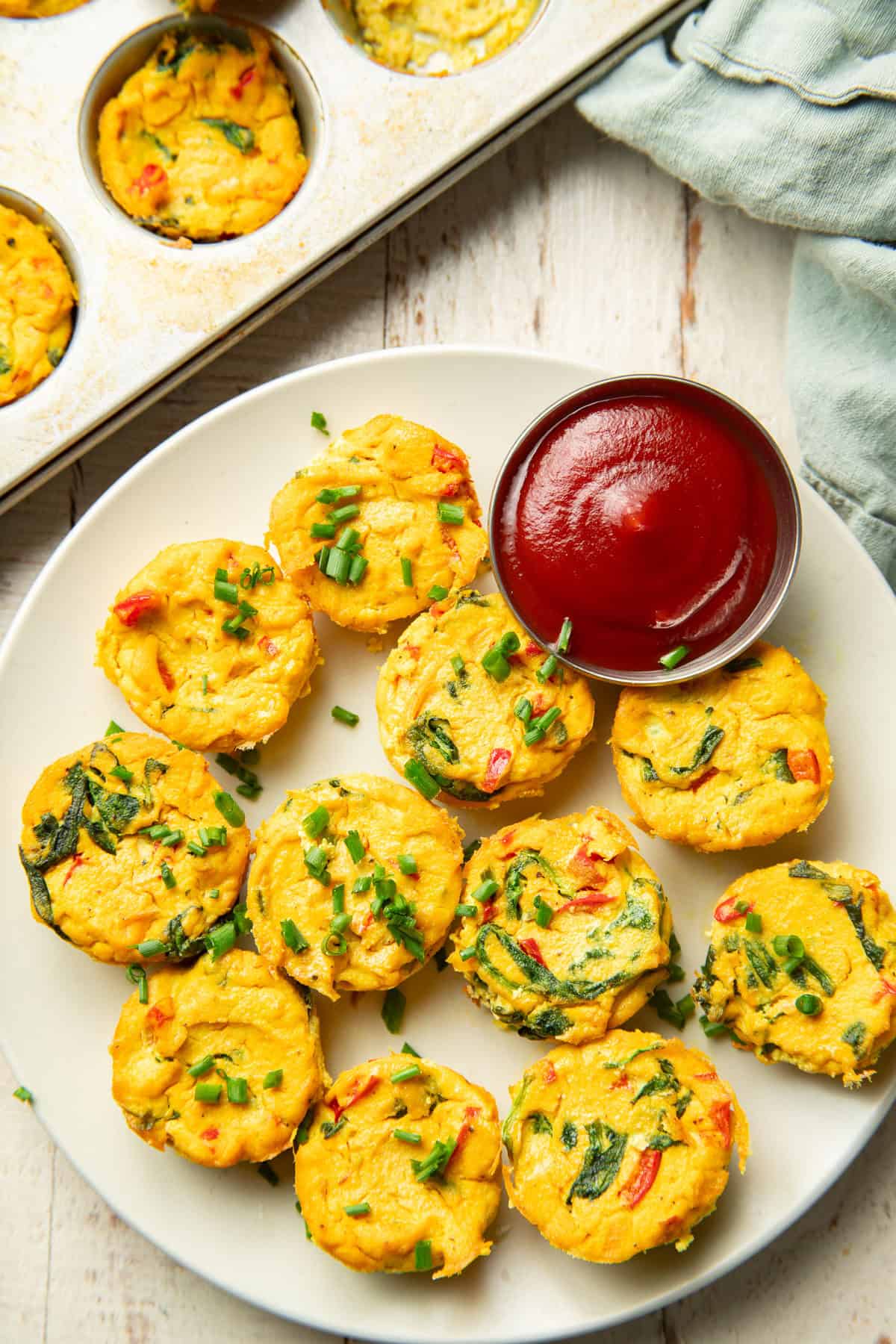 Plate of Vegan Egg Bites with dish of ketchup.
