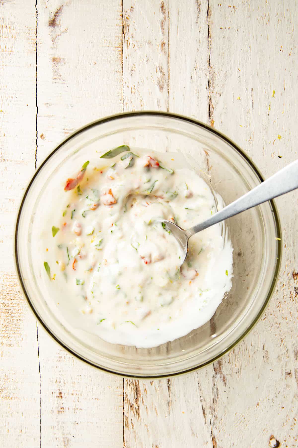 Marry Me Burger sauce in a bowl with spoon.