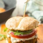 Marry Me Chickpea Burger with a skillet and bowl in the background.
