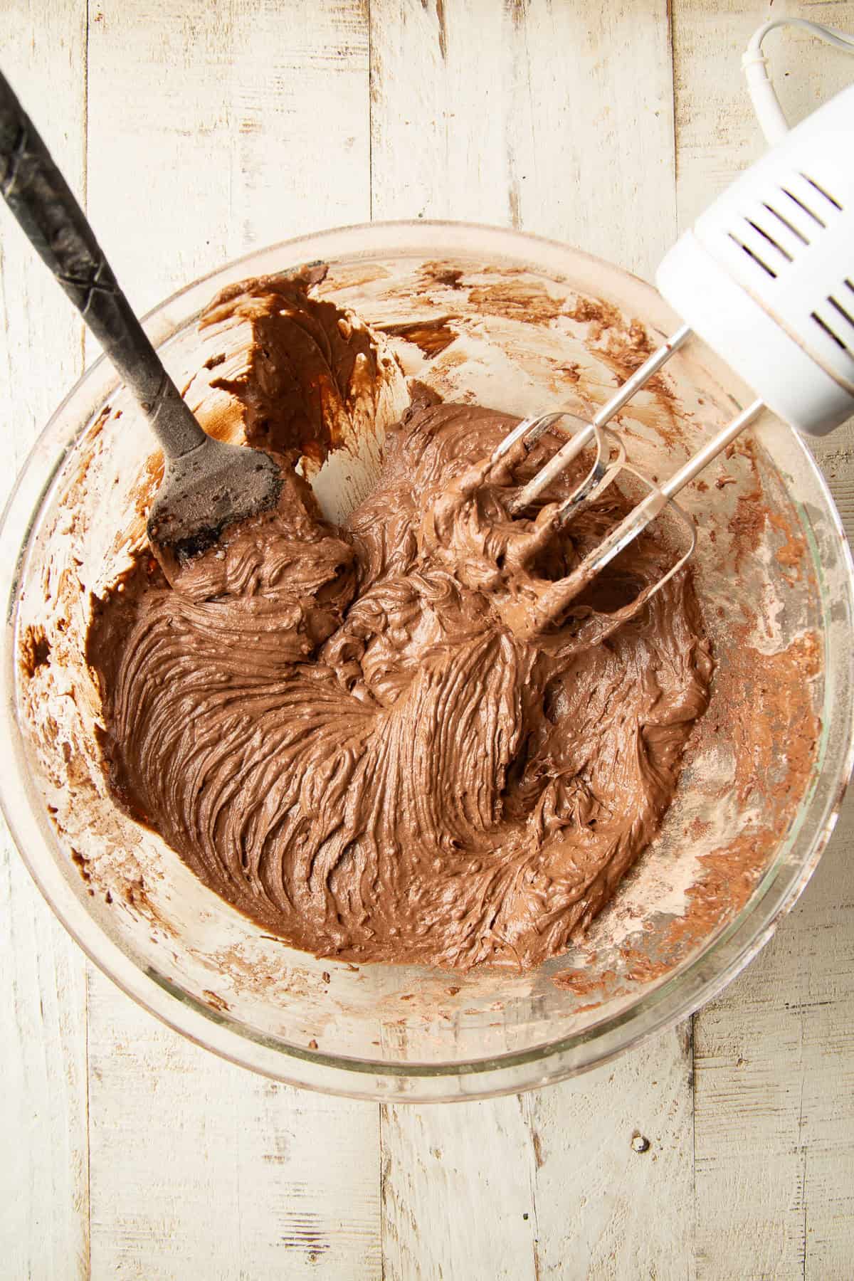 Vegan Whoopie Pies batter in a mixing bowl with electric mixer.