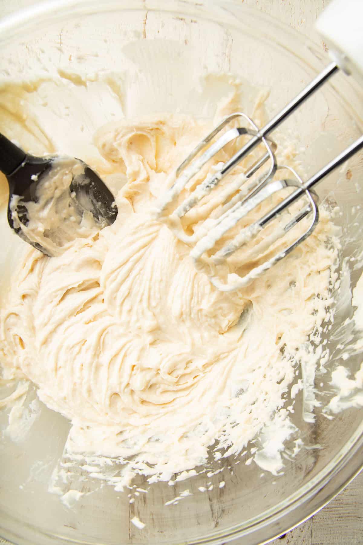 Vegan Whoopie Pie filling in a mixing bowl with electric mixer.