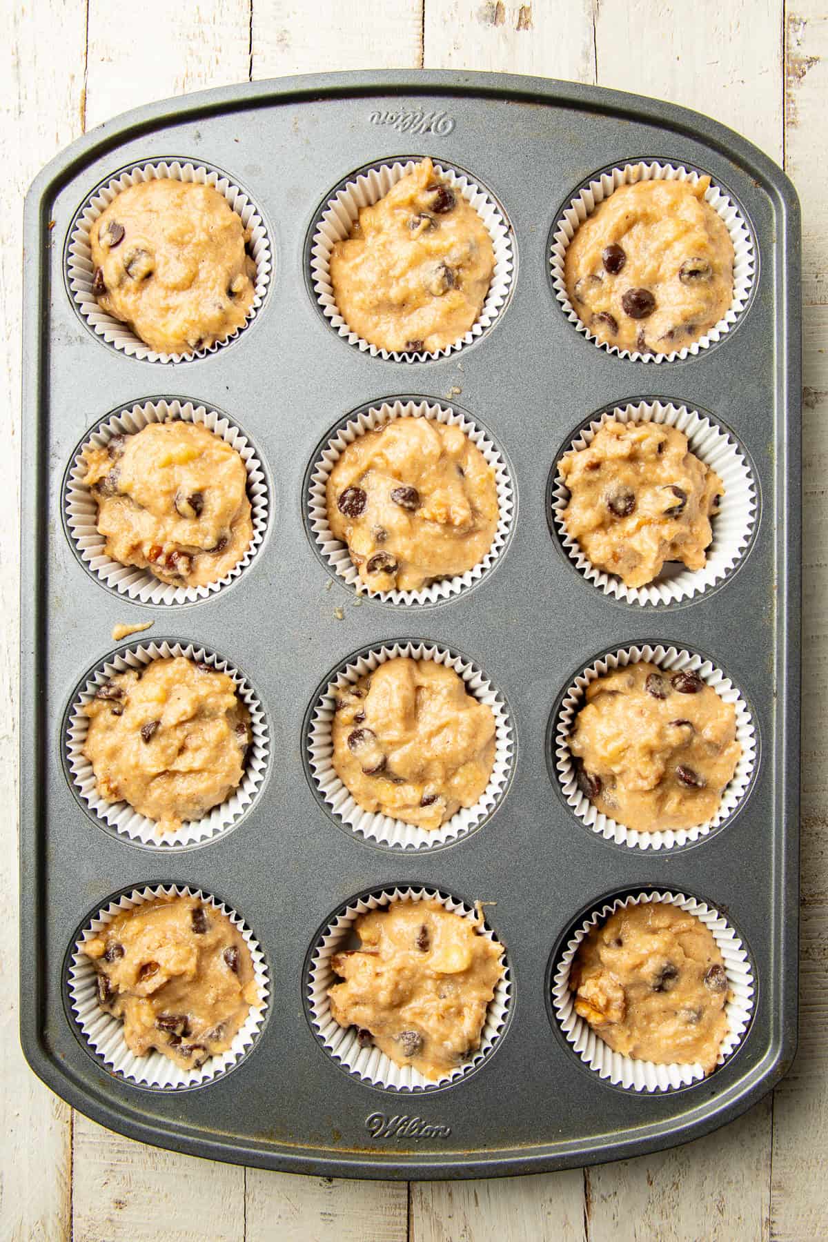 Almond flour muffin batter in a tin.