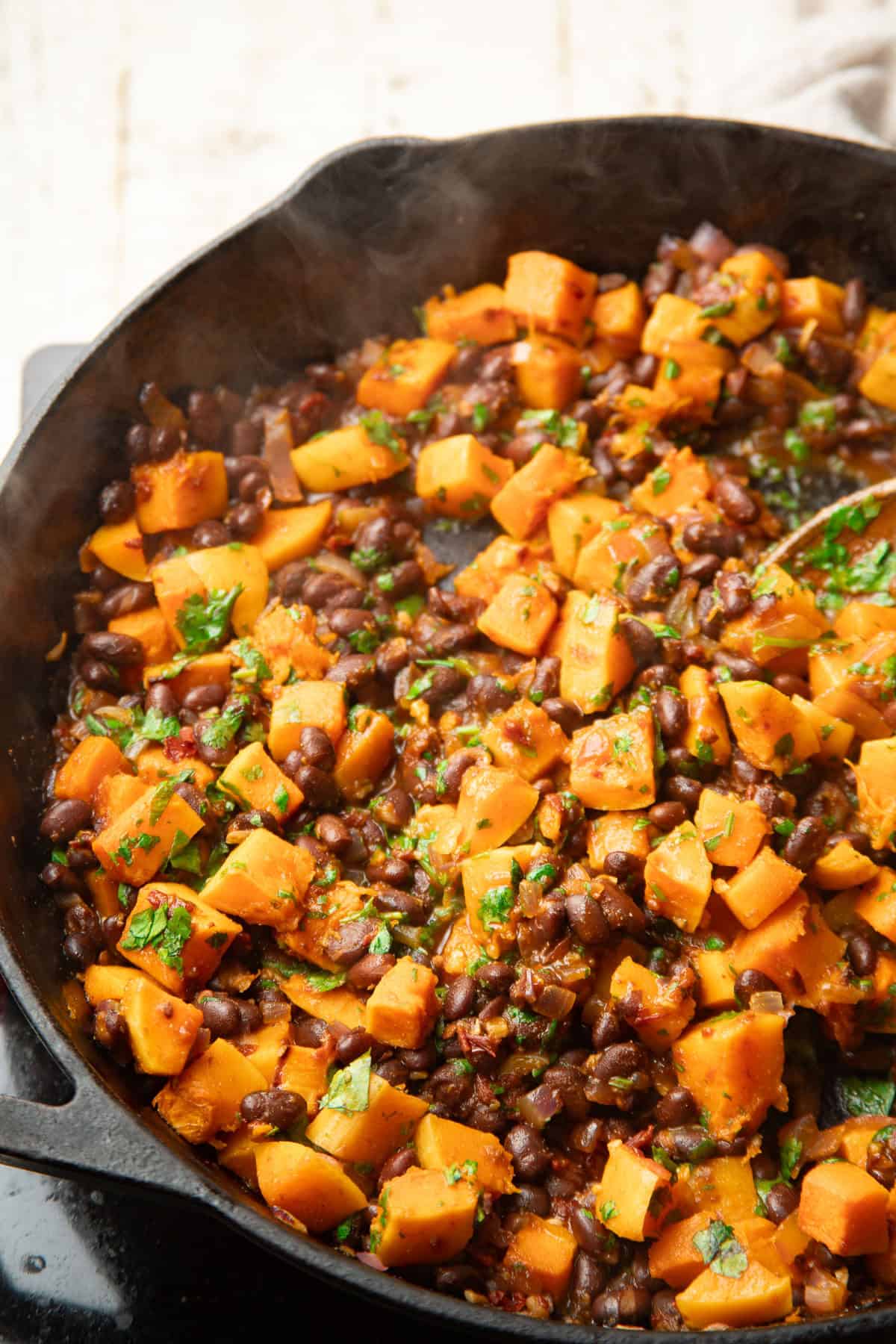 Butternut Squash Black Bean Chimichanga filling in a skillet.